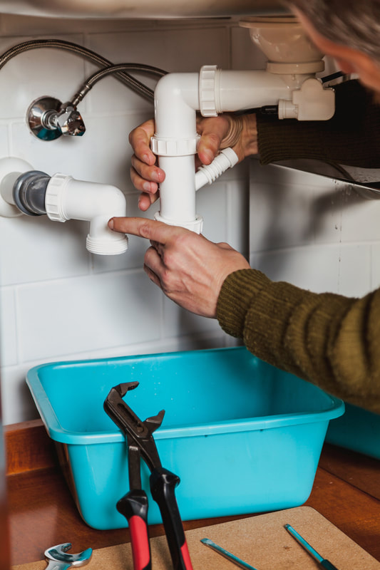 Delaware County Handyman Replacing A Sink Trap That Was Old And Broken